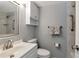 Well-maintained bathroom featuring a shower, vanity, and coordinated accessories for a comfortable experience at 112 W Cypress Ct, Oldsmar, FL 34677