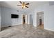 Spacious bedroom featuring a ceiling fan and access to a full bath and kitchen at 1227 E Madison St # 902, Tampa, FL 33602