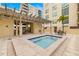 Outdoor hot tub featuring tiled trim, providing a serene space for relaxation at 1227 E Madison St # 902, Tampa, FL 33602