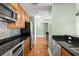 Open kitchen area with stainless steel appliances and lots of counter space at 1227 E Madison St # 902, Tampa, FL 33602