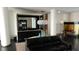 Stylish living room featuring modern decor, dark hardwood floors, and ample seating at 1227 E Madison St # 902, Tampa, FL 33602