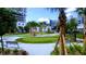 Outdoor putting green with lush landscaping, providing an excellent space for recreation at 1227 E Madison St # 902, Tampa, FL 33602