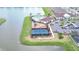 Aerial view showcasing the community's pool, playground, tennis courts, and clubhouse at 12905 Brookside Moss Dr, Riverview, FL 33579