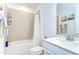 Bathroom featuring a tub-shower combination and single sink at 12905 Brookside Moss Dr, Riverview, FL 33579