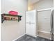 Clean kitchen pantry and sleek black countertops at 1542 Rebecca Ln, Dunedin, FL 34698