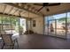 The home's outdoor space features dual ceiling fans and a screened enclosure at 1606 S Arrawana Ave, Tampa, FL 33629