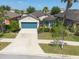 Aerial view of house highlighting its curb appeal and driveway at 16313 Treasure Point Dr, Wimauma, FL 33598