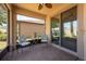 Relaxing screened patio with stylish furniture and outdoor views at 16313 Treasure Point Dr, Wimauma, FL 33598
