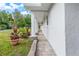 Charming walkway with stone accents and lush landscaping leading to the home at 16411 Lake Byrd Dr, Tampa, FL 33618