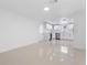 Open-concept kitchen featuring stainless steel appliances, white cabinets, and ample counter space at 16411 Lake Byrd Dr, Tampa, FL 33618