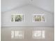 Bright living room with high ceilings and ample windows at 16411 Lake Byrd Dr, Tampa, FL 33618