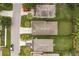 An aerial view showcases well-maintained homes and green backyards in a residential neighborhood at 17413 Garden Heath Ct, Land O Lakes, FL 34638