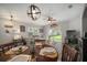 Open-concept dining and living area, showcasing a cozy and well-lit space with backyard views at 17413 Garden Heath Ct, Land O Lakes, FL 34638