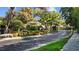 Landscaped community entrance with a fountain and gated entry at 1915 Floresta View Dr, Tampa, FL 33618