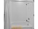 The bathroom features a shower with white subway tile, a bathtub, and a shower curtain for privacy at 1915 Floresta View Dr, Tampa, FL 33618