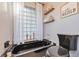 A relaxing bathroom with a soaking tub and a unique glass block window at 220 Singapore Rd, Punta Gorda, FL 33950