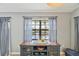 Dining area with water view, wooden table and chairs, and nautical-themed decor at 220 Singapore Rd, Punta Gorda, FL 33950