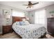 Bedroom featuring a full bed, seashell-themed bedding, and neutral-toned walls at 2400 62Nd N St, St Petersburg, FL 33710