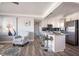 Open concept kitchen with modern appliances and a breakfast bar, perfect for casual dining at 2400 62Nd N St, St Petersburg, FL 33710