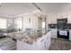 Modern kitchen with a large island, stainless steel appliances, and sleek white cabinetry at 2400 62Nd N St, St Petersburg, FL 33710