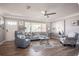 Cozy living room featuring elegant furniture, stylish decor, and ample natural light at 2400 62Nd N St, St Petersburg, FL 33710