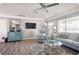 Bright living room featuring hardwood floors and calming color palette at 2400 62Nd N St, St Petersburg, FL 33710
