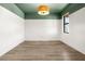 Bright and airy bedroom featuring modern lighting at 2563 Ocean Breeze Ln, Clearwater, FL 33761