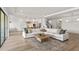 Bright living room with view into the kitchen, featuring a contemporary design at 2563 Ocean Breeze Ln, Clearwater, FL 33761