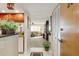 Inviting condo foyer with tile floors, coat closet, and a glimpse into the open living area beyond at 2595 Countryside Blvd # 8205, Clearwater, FL 33761