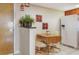 Charming kitchen with breakfast nook, showcasing ample storage and a cozy dining space at 2595 Countryside Blvd # 8205, Clearwater, FL 33761
