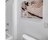 Bathroom with tub and a wall art above the toilet at 32775 Brooks Hawk Ln, Wesley Chapel, FL 33543