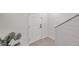 Clean entryway featuring a door and tiled floors at 32775 Brooks Hawk Ln, Wesley Chapel, FL 33543