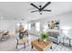 Open-concept living space including a living room and dining area at 32775 Brooks Hawk Ln, Wesley Chapel, FL 33543