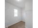 Walk-in closet with built-in shelving and hardwood floors at 32775 Brooks Hawk Ln, Wesley Chapel, FL 33543