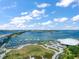 Aerial view of community showing off the waterways, park, landscaping and bridge nearby at 331 Cleveland St # 1806, Clearwater, FL 33755