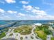 Aerial view of the community showing the park, landscaping, waterway, and bridge access at 331 Cleveland St # 1806, Clearwater, FL 33755