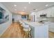 Spacious modern kitchen with a large island, stainless steel appliances, and barstool seating at 331 Cleveland St # 1806, Clearwater, FL 33755
