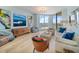 Bright living room with modern furniture, decor, and breathtaking water views at 331 Cleveland St # 1806, Clearwater, FL 33755