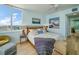 Brightly lit main bedroom offers floor-to-ceiling windows, gorgeous views, and contemporary decor at 331 Cleveland St # 1806, Clearwater, FL 33755