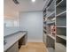 Well-organized office space with built-in storage and a sleek desk setup at 331 Cleveland St # 1806, Clearwater, FL 33755