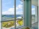 Enjoy the views through the floor-to-ceiling windows of the bay and the walking path at 331 Cleveland St # 1806, Clearwater, FL 33755