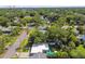 Aerial view of home with green lawns and trees in a residential neighborhood at 3626 17Th N St, St Petersburg, FL 33713