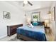 This bright bedroom features one window, ceiling fan and simple decoration at 3626 17Th N St, St Petersburg, FL 33713