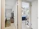 Hallway showing bedroom areas featuring terrazzo flooring and neutral paint at 3626 17Th N St, St Petersburg, FL 33713