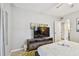 Main bedroom featuring entertainment center and view into another room at 3626 17Th N St, St Petersburg, FL 33713