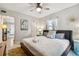 Light and airy main bedroom with ceiling fan and adjacent side table at 3626 17Th N St, St Petersburg, FL 33713