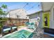 Charming patio featuring outdoor seating, a grill, a colorful rug, and string lights for a relaxing atmosphere at 3626 17Th N St, St Petersburg, FL 33713