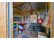Well-organized storage shed with shelves, equipment, and various lawn care supplies at 3626 17Th N St, St Petersburg, FL 33713