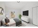 Bright and airy bedroom with modern furnishings and ample natural light at 3803 E Curtis St, Tampa, FL 33610