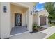 Stylish front entrance with modern lighting fixtures and a unique glass-paneled door at 3803 E Curtis St, Tampa, FL 33610